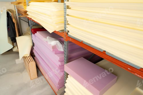 Preview: Stacked sheets of foam rubber for furniture production in factory workshop