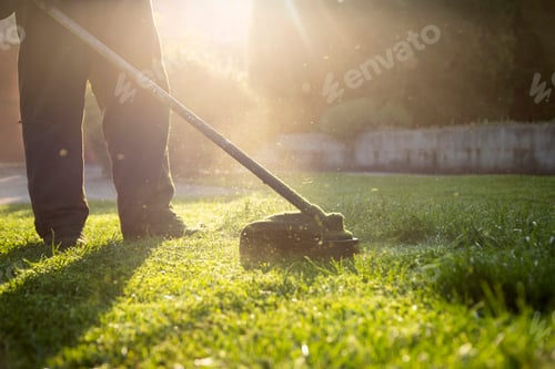 Preview: Lawn mover on green grass. Machine for cutting lawns.