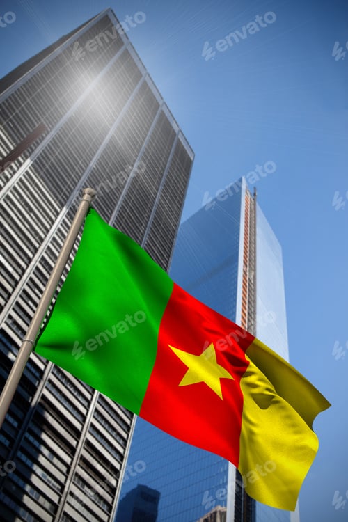 Preview: Cameroon National Flag Against Low Angle View Of Skyscrapers