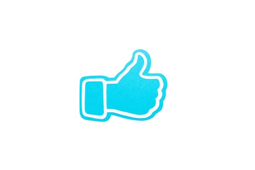Preview: blue thumb up sign isolated on white