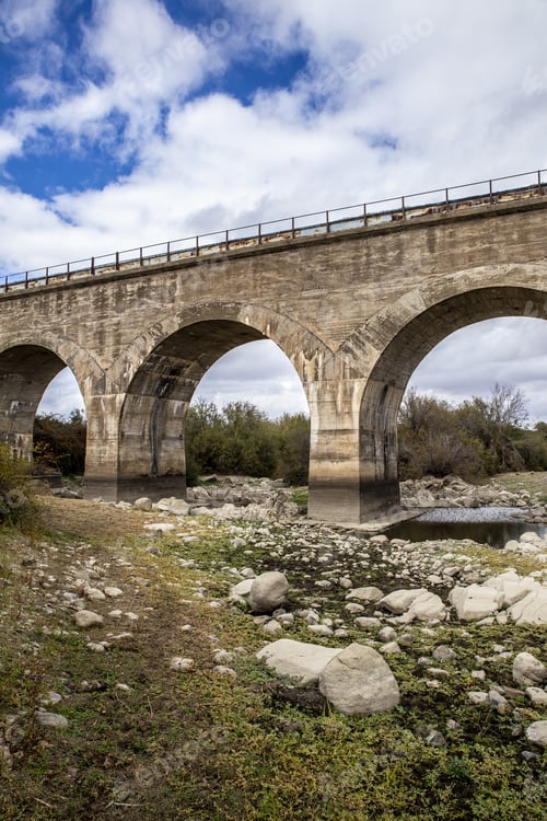 Preview: Stone bridge with arches and a cloudy sky