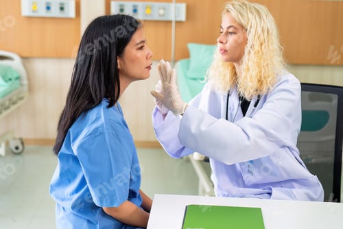 Preview: Young woman consult with doctor for botulinum toxin botox face injection at beauty treatment clinic