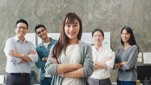 Preview: businessman and businesswoman smart casual wear looking at camera and smile.