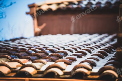 Preview: Snow On Red Tiled Roof Of The House