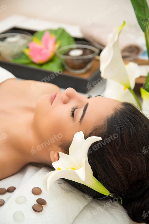 Preview: Pretty young woman having a massage