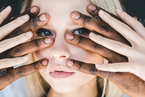 Preview: cropped image of african american boyfriend touching attractive blonde girlfriend face isolated on