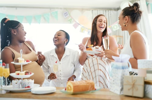 Preview: Shot of a group of women eating dessert while celebrating at a friends baby shower