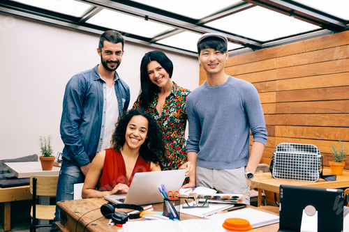 Preview: Portrait of four multiethnic people in the office