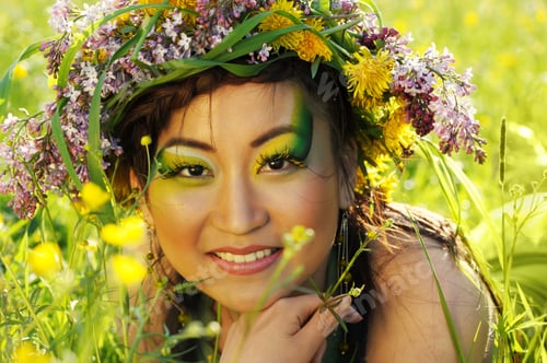 Vista previa: Asian Woman In Nature With Chaplet On Head