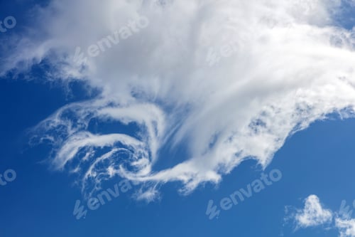 Preview: Fluffy cumulus cloud on blue sky background. Cloudscape white and grey color