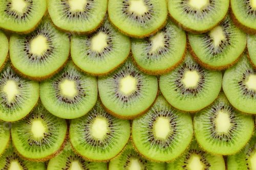Fresh Sliced Kiwi Fruit Background Texture