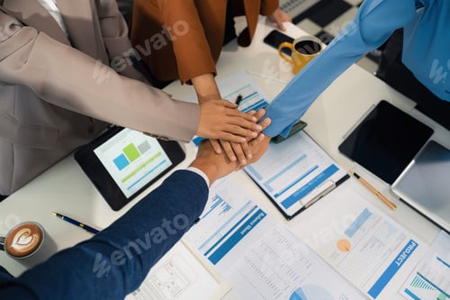 Preview: business people holding each others wrists, join hands together, support and unity, team strength