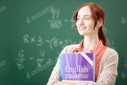 Preview: Red-haired English teacher feeling thoughtful before lesson