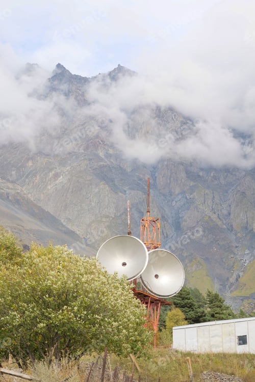 Preview: Telecommunications satellite dish radio telescope in mountains. Earth based astronomical locator