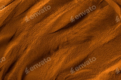 Preview: top view of textured beach sand with waves and orange color filter