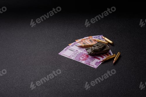 Preview: Money and flag of India with ammunition and tank as a concept of weapons for war. India and weapons
