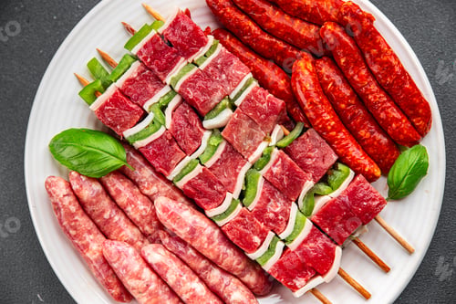 Preview: raw sausage meat assorted juicy pork, beef fresh delicious gourmet food background on the table