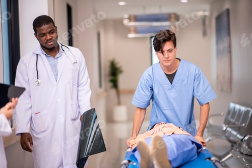 Preview: medics and patient on hospital gurney at emergency