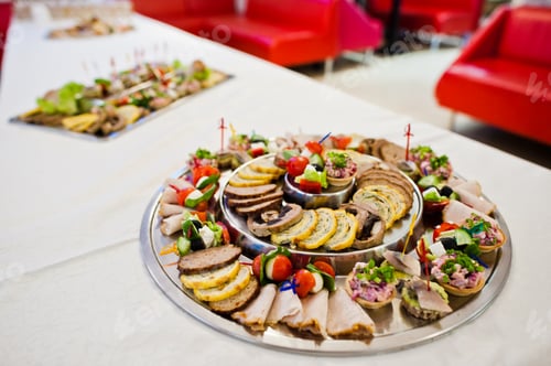 Preview: Close-up photo of salty snacks made with meat on the table.