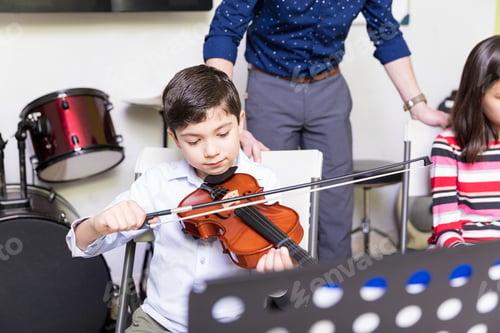 Preview: Boy Practicing To Be A Good Violin Player