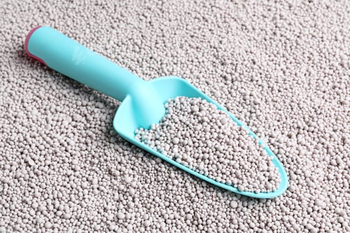 Preview: Metal trowel on chemical fertilizer. Gardening season