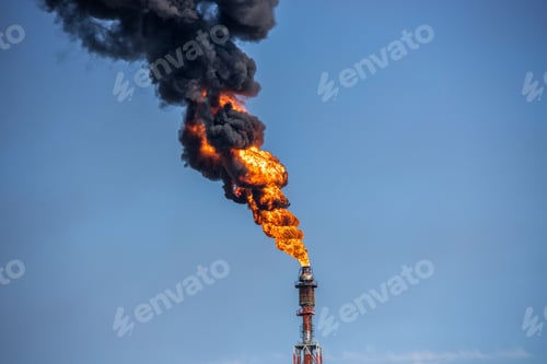 Preview: Power tower burning in the daytime.