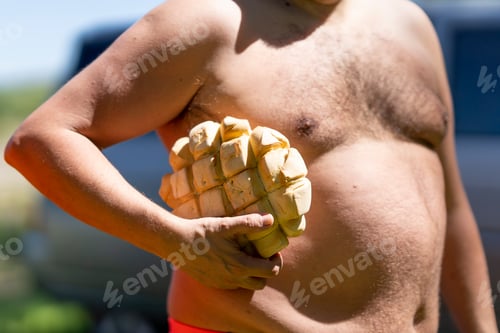 Preview: The bread under the arm of fat man