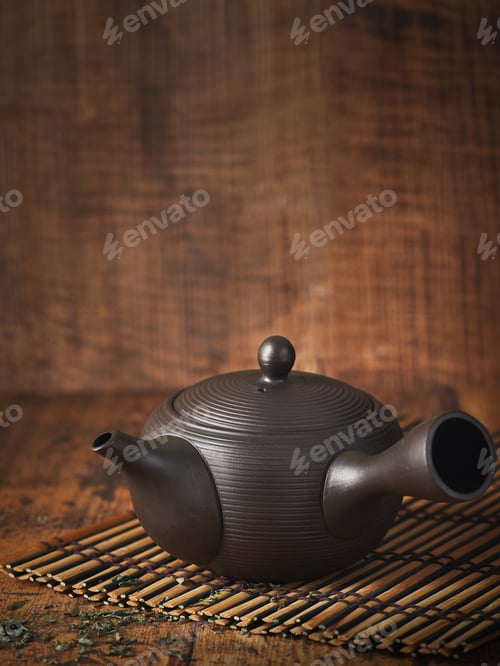 Preview: Traditional japanese ceramic brown teapot. Wabi sabi concept.