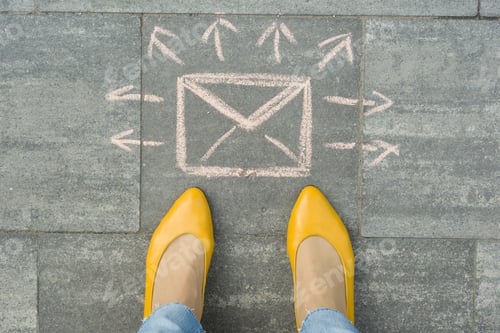 Preview: Female feet with abstract envelope message letter