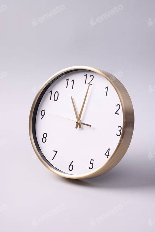 Preview: Close-up of a wall clock. The concept of time and work time is valuable for life,