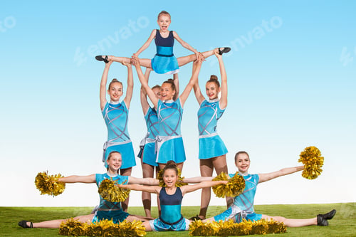 Preview: The Group Of Teen Cheerleaders Posing At White Studio