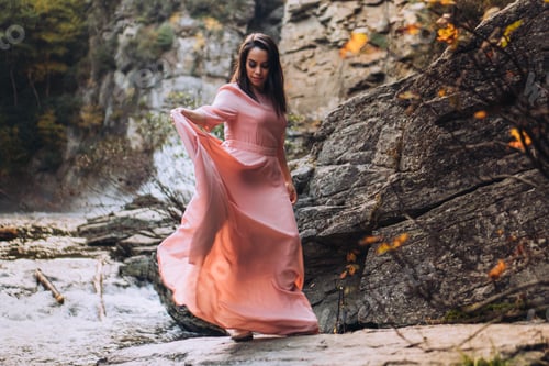 Preview: Woman wearing beautiful dress in nature