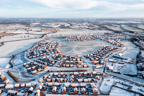 Preview: England suburban housing estate winter snow aerial view