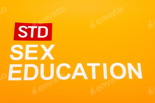 Preview: top view of sex education and std lettering isolated on orange
