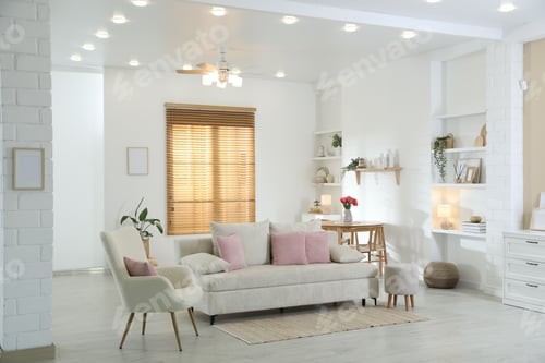 Preview: Comfortable sofa with cushions in room. Interior design