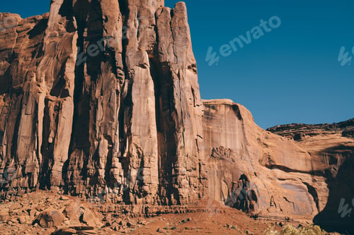 Preview: Rough tall red sandstone cliff