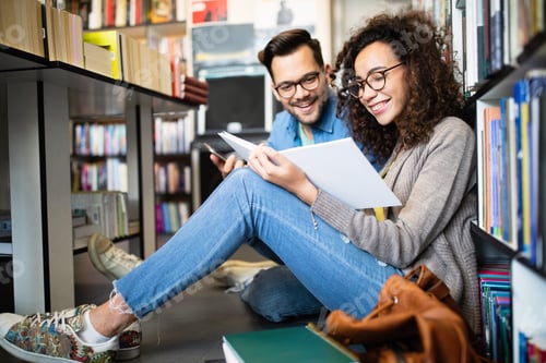 Preview: Group of students study at library. Learning and preparing for university exam