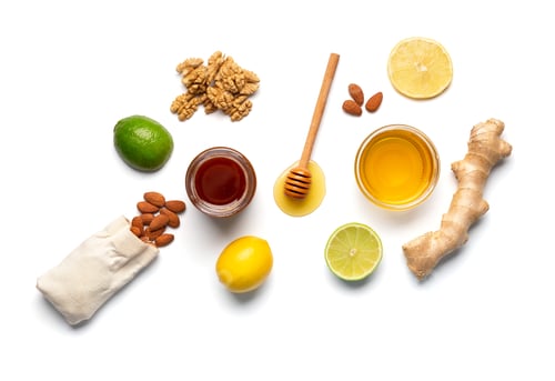 Preview: Composition of honey in a jars, lemon, lime, ginger isolated.