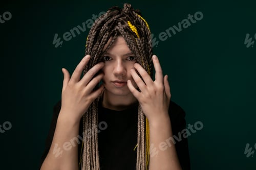 Preview: Woman With Dreadlocks Covering Her Face