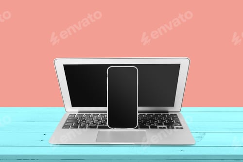 Preview: Laptop and mobile on the table