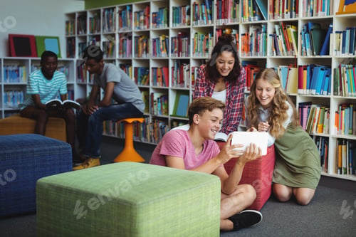 Preview: Students using digital tablet in library