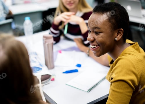 Preview: Group of students learning in classroom
