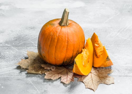 Preview: Ripe pumpkin with leaves.