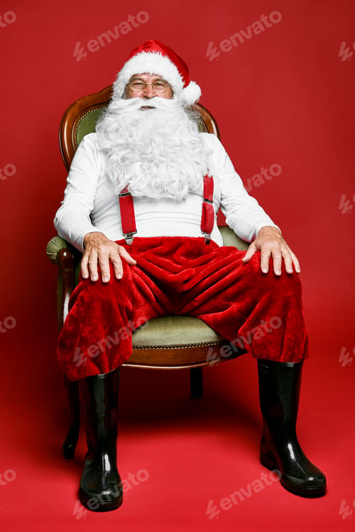 Preview: Portrait of caucasian Santa Claus sitting on the retro chair