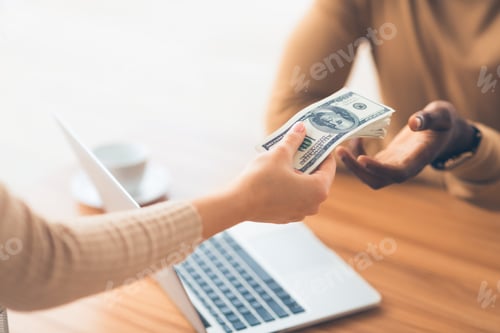 Preview: Black man receiving bribe money from partner