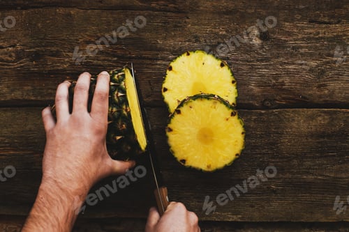 Pineapple Slices on Rustic Wooden Cutting Board