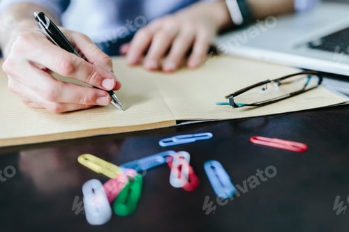 Preview: Young businessman working in office
