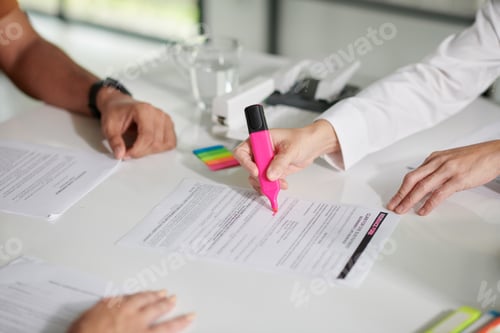 Preview: Manager highlighting important part of document with pink color