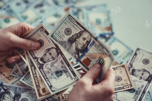 Preview: Millennial candid authentic man close up hand counting various usd dollar banknotes at natural light