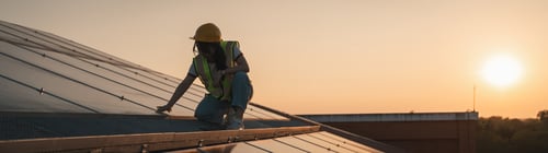 Preview: Service engineer checking solar cell on the roof for maintenance if there is a damaged part.
